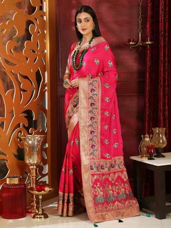 Grab This Very Pretty Heavy Embroidered Silk Based Saree In Dark Pink Color Paired With Dark Pink Colored Blouse. This Pretty Saree Is Suitable For Any Wedding Function Or Festive Wear.