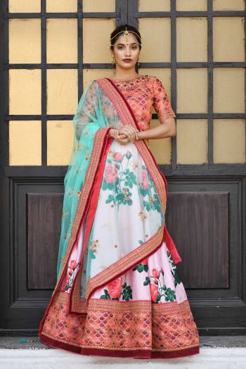 Adorn a Very Pretty Look Wearing This Designer Lehenga Choli In Orange Colored Blouse Paired With Light Pink Colored Lehenga And Contrasting Sea Green Colored Dupatta. Its Heavy Embroidered Blouse Is Fabricated On Art Silk Paired With Digital Printed Art Silk Lehenga And Net Fabricated Dupatta. 