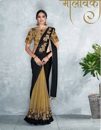 A pre-pleated version of new-age bridal attire in unconventional color combination , golden embroidery and frill will make you look like a diva . 