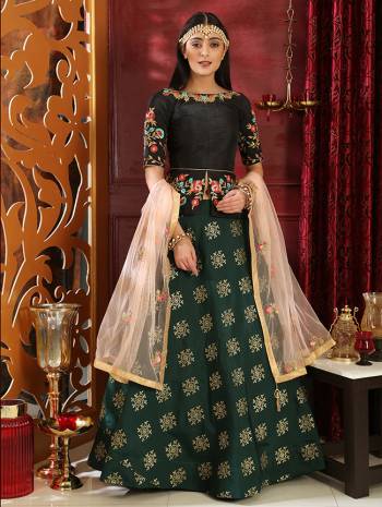 New And Unique Combination Is Here With This Designer Lehenga Choli In Black Colored Blouse Paired With Dark Green Colored Lehenga And Peach Colored Dupatta. Its Embroidered Blouse Is Fabricated on Art Silk Paired With Jacquard Silk Lehenga And Net Fabricated Dupatta. Buy This Pretty Piece Now.