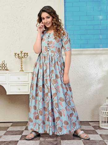 Rich And Elegant Looking Readymade Long Kurti Is Here In Steel Blue Color. It Is Fabricated On Muslin Beautified With Pretty Prints All Over. Also Its Fabric Ensures Superb Comfort all Day Long. 