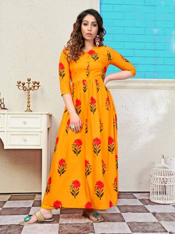 Add Some Semi-Casuals With This Readymade Long Kurti In Musturd Yellow Color Fabricated Muslin. It Is Beautified With Prints All Over And Is Available In All Regular Sizes. 