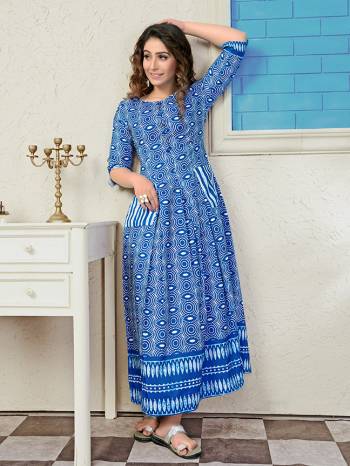 Rich And Elegant Looking Readymade Long Kurti Is Here In Blue Color. It Is Fabricated On Muslin Beautified With Pretty Prints All Over. Also Its Fabric Ensures Superb Comfort all Day Long. 