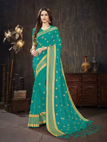 For A Rich And Elegant Look, Grab This Silk Based Designer Saree In Blue Color. This Saree And Blouse are Fabricated On Art Silk Beautified With Weave And Jari Embroidered Butti. Buy This Saree Now.