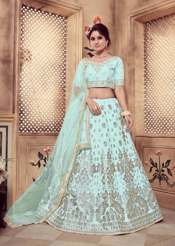 Here Is A Very Beautiful Designer Lehenga Choli In Rich Subtle Shade Of Aqua Blue. This Lehenga Choli Is Fabricated On Art Silk Paired With Net Fabricated Dupatta. Its Pretty Color Will Definitely  Earn You Lots Of Compliments. 