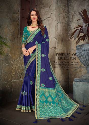 Attract All Wearing This Designer Silk Based Saree In Royal Blue Color Paired With Contrasting Sea Green Colored Blouse. This Saree Is Fabricated On Art Silk And Jacquard Silk Beautified With Weaved Pallu And Embroidery.