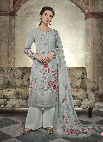 Flaunt Your Rich And Elegant Taste Wearing This Designer Straight Suit In Elegant Grey Color. This Beautiful Digital Printed Suit Is Fabricated On Satin Cotton Paired With Cotton Bottom And Mal Cotton Fabricated Dupatta. It Is More Highlighted With Attractive Sequence Work. 