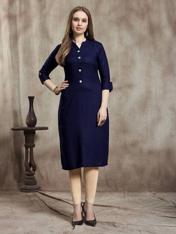 Simple And Elegant Readymade Plain Kurti Is Here In Navy Blue Color For Your Casual Wear. This Kurti Is Fabricated On Rayon And Available In All Regular Sizes. It Is Suitable For College Wear, Home Or Work Place. 