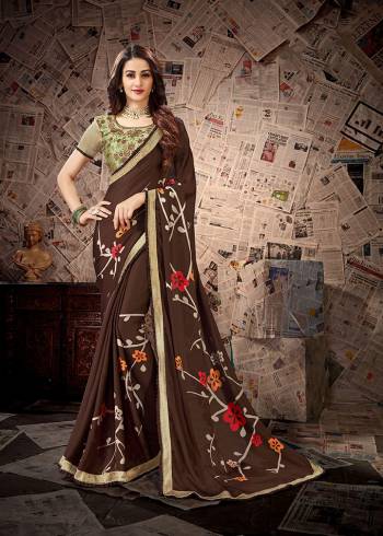 Simple and Elegant Looking Designer Printed Saree Is Here In Brown color Paired With Beige Colored Embroidered Blouse. This Saree Is Satin Georgette Based Paired With Cotton Slub Fabricated Blouse. Its Fabrics Are Light Weight And Easy To Carry All Day Long.