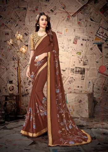 Simple and Elegant Looking Designer Printed Saree Is Here In Brown color Paired With Beige Colored Embroidered Blouse. This Saree Is Satin Georgette Based Paired With Cotton Slub Fabricated Blouse. Its Fabrics Are Light Weight And Easy To Carry All Day Long.