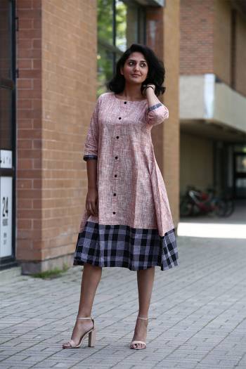 Simple And Elegant Looking Designer Readymade Tunic Is Here In Peach Color Fabricated On Khadi Cotton. Its Fabric IS Light Weight And Available In All Sizes.