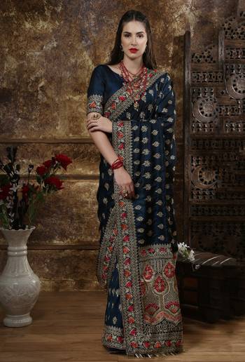 Enhance Your Personality Wearing This Heavy Designer Saree In Navy Blue Color Paired With Navy Blue Colored Blouse. This Heavy Embroidered Saree And blouse Are Fabricated On Art Silk. Its Rich Fabric And Bold Color will Earn You Lots Of Compliments From onlookers. 