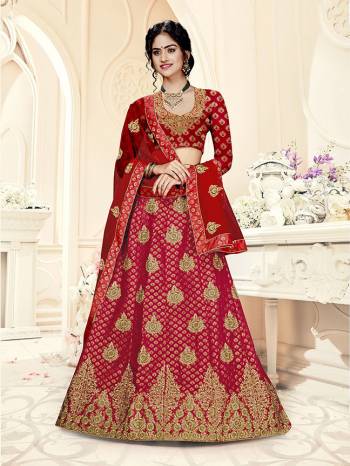 Grab This Heavy Designer Lehenga Choli In All Over Red Color. Its Blouse Is Fabricated On Art Silk Paired With Jacquard Silk Fabricated Lehenga And Net Fabricated Dupatta. It Is Beautified With Weave And Embroidery Which Is Making It More Attractive. 