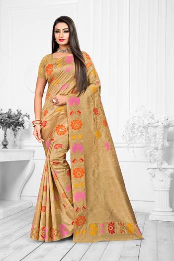 Here Is A Very Pretty Designer Silk Based For The Upcoming Festive Season. This Weaved Saree Is Fabricated On Banarasi art Silk Paired With Art Silk Fabricated Blouse. You Will Definitely Earn Lots Of Compliments In This Complete Traditional Look. 