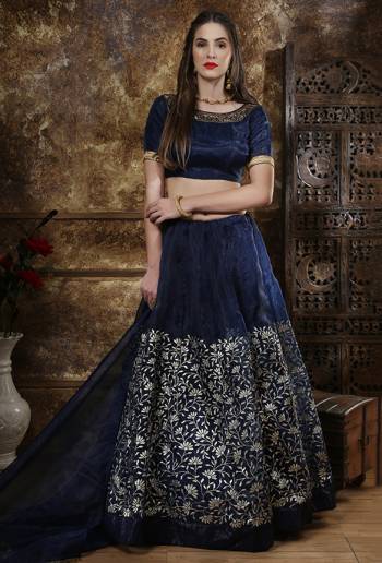 Enhance Your Personality Wearing This Bold Colored Designer Lehenga Choli In Navy Blue Color. This Lehenga Choli And Dupatta Are Fabricated On Orgenza Beautified With Foil Print And Hand Work. 