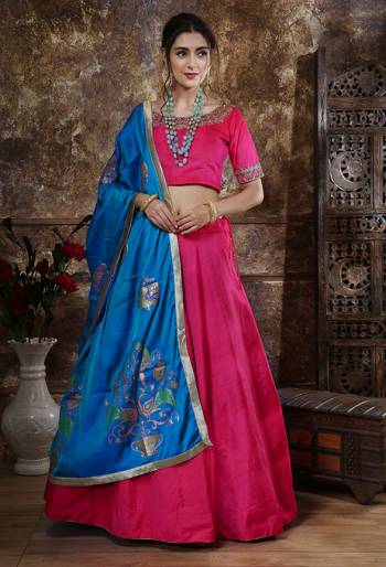 Shine Bright Wearing This Designer Lehenga Choli In Rani Pink Color Paired With Blue Colored Dupatta. This Lehenga And Choli Are Fabricated On Art Silk Paired With Soft Silk Fabricated Dupatta. Buy Now.