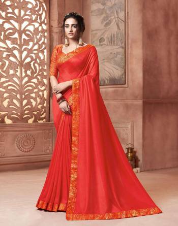 Celebrate This Festive Season With Beauty and Comfort Wearing This Designer Saree In Orange Color . This Saree Is Fabricated On Satin Silk Paired With Art Silk Fabricated Weave Blouse. It Is Beautified With Weave Lace Border Over The Saree. Buy Now.