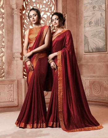 Celebrate This Festive Season With Beauty and Comfort Wearing This Designer Saree In Maroon Color . This Saree Is Fabricated On Satin Silk Paired With Art Silk Fabricated Weave Blouse. It Is Beautified With Weave Lace Border Over The Saree. Buy Now.