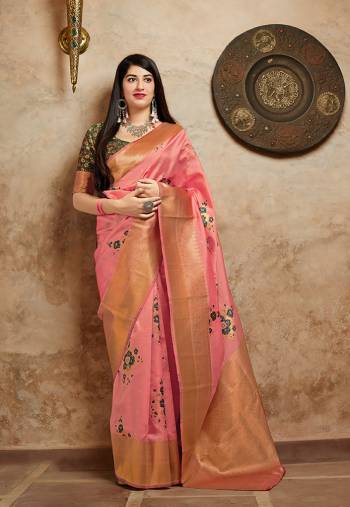 Here Is A Very Pretty Designer Silk Based For The Upcoming Festive Season. This Weaved Saree And Blouse are Fabricated On Banarasi Art Silk Which Gives A Rich And You Will Definitely Earn Lots Of Compliments In This Complete Traditional Look