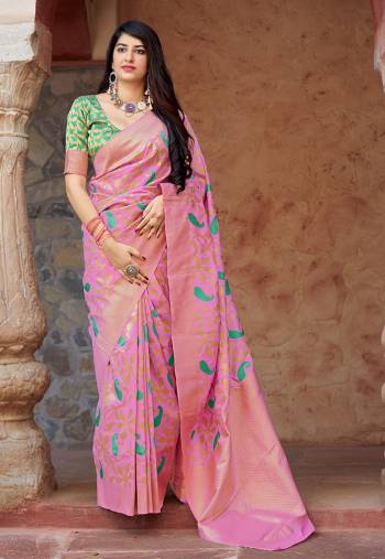 Here Is A Very Pretty Designer Silk Based For The Upcoming Festive Season. This Weaved Saree And Blouse are Fabricated On Banarasi Art Silk Which Gives A Rich And You Will Definitely Earn Lots Of Compliments In This Complete Traditional Look