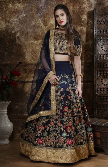 Enhance your Personality Wearing This Heavy Designer Lehenga Choli In All Over Navy Blue Color. Its Blouse And Lehenga are Silk Based Paired With net Fabricated Dupatta. Buy This Pretty Designer Piece Now. 