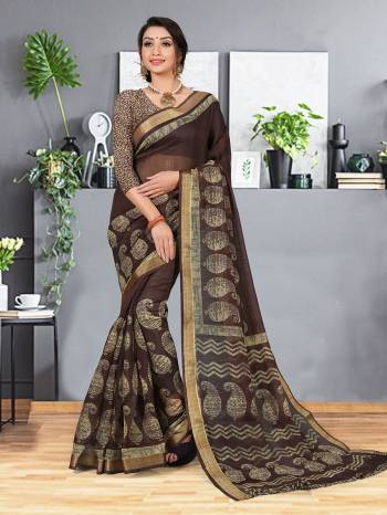 Simple and Elegant Looking Designer Printed Saree Is Here In Brown Color. This Saree And Blouse are fabricated On Cotton Silk beautified With Prints And Weaved Lace Border. It Is Light In Weight and easy To Carry all Day Long. 