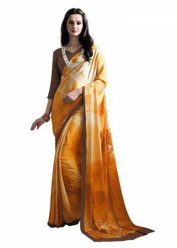 Add Some Casuals With This Pretty Saree Fabricated On Crepe. This Saree And Blouse are Beautified With prints And It Is Light Weight And Easy To Carry All Day Long