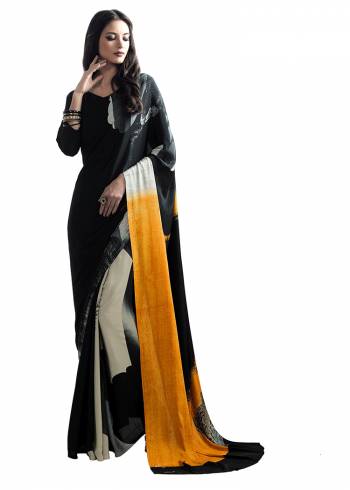 Add Some Casuals With This Pretty Saree Fabricated On Crepe. This Saree And Blouse are Beautified With prints And It Is Light Weight And Easy To Carry All Day Long