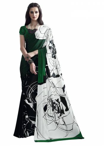 Add Some Casuals With This Pretty Saree Fabricated On Crepe. This Saree And Blouse are Beautified With prints And It Is Light Weight And Easy To Carry All Day Long