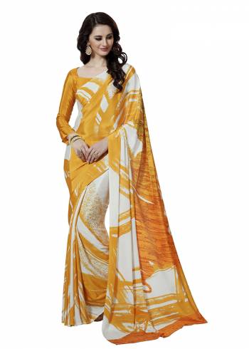 Add Some Casuals With This Pretty Saree Fabricated On Crepe. This Saree And Blouse are Beautified With prints And It Is Light Weight And Easy To Carry All Day Long