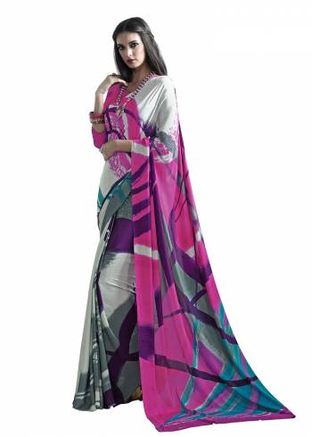 Add Some Casuals With This Pretty Saree Fabricated On Crepe. This Saree And Blouse are Beautified With prints And It Is Light Weight And Easy To Carry All Day Long