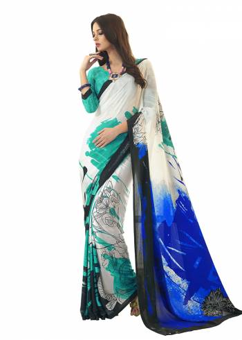 Add Some Casuals With This Pretty Saree Fabricated On Crepe. This Saree And Blouse are Beautified With prints And It Is Light Weight And Easy To Carry All Day Long