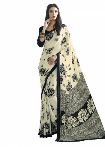 Add Some Casuals With This Pretty Saree Fabricated On Crepe. This Saree And Blouse are Beautified With prints And It Is Light Weight And Easy To Carry All Day Long