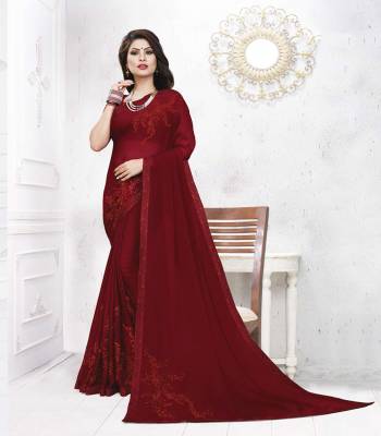 For A Royal Look, Grab This Designer Saree In Maroon Color Paired With Maroon Colored Blouse. This Saree Is Satin Georgette Paired With art Silk Fabricated Blouse. It Is Light In Weight And Easy To Carry All Day Long. 