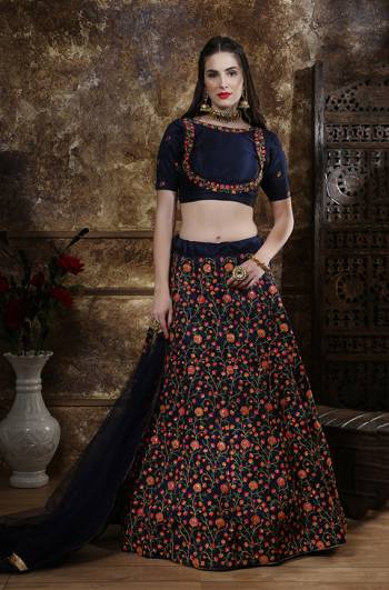 Enhance Your Personality Wearing This Attractive And Heavy Embroidered Designer Lehenga Choli In Navy Blue Color. This Lehenga Choli Is Fabricated On Art Silk Paired With Net Fabricated Dupatta. Buy This Bold And Stylish Lehenga Choli Now.