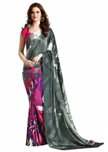 Add Some Casuals With This Pretty Saree Fabricated On Crepe. This?Saree And Blouse are Beautified With prints And It Is Light Weight And Easy To Carry All Day Long