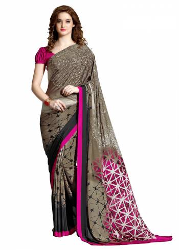 Add Some Casuals With This Pretty Saree Fabricated On Crepe. This?Saree And Blouse are Beautified With prints And It Is Light Weight And Easy To Carry All Day Long