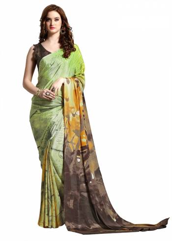 Add Some Casuals With This Pretty Saree Fabricated On Crepe. This?Saree And Blouse are Beautified With prints And It Is Light Weight And Easy To Carry All Day Long