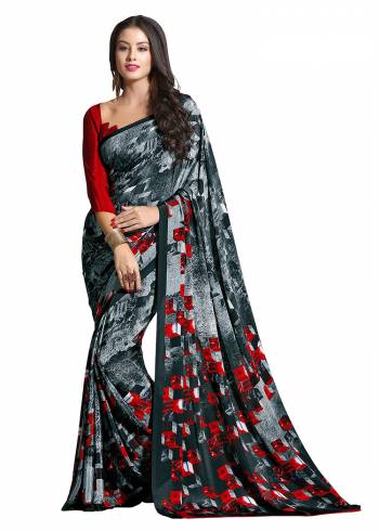 Add Some Casuals With This Pretty Saree Fabricated On Crepe. This?Saree And Blouse are Beautified With prints And It Is Light Weight And Easy To Carry All Day Long