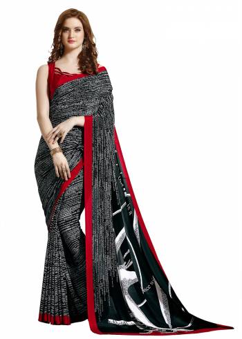 For Your Casuals Or Semi-Casuals, Grab This Light Weight Printed?Saree Fabricated On Crepe. Its Fabric IS Soft Towards Skin And Ensures Superb Comfort All Day Long. Buy Now.