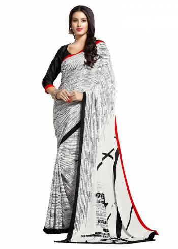 Add Some Casuals With This Pretty Saree Fabricated On Crepe. This?Saree And Blouse are Beautified With prints And It Is Light Weight And Easy To Carry All Day Long