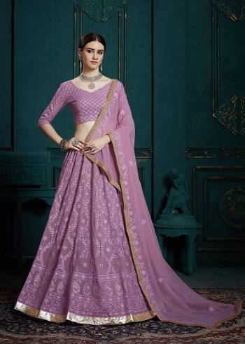 Very Pretty And Trending Shade In Purple Is Here With This Heavy Designer Lehenga Choli In Lavendor Color. This Pretty Lehenga Choli Is Georgette Based Beautified with Subtle Tone To Tone Embroidery. Its Pretty Color And Elegant Embroidery Will Rarn You Lots Of Compliments From Onlookers.