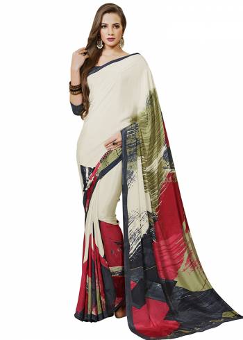 Add Some Casuals With This Pretty Saree Fabricated On Crepe. This?Saree And Blouse are Beautified With prints And It Is Light Weight And Easy To Carry All Day Lon