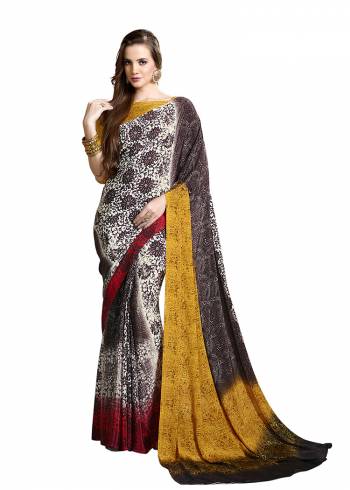 Add Some Casuals With This Pretty Saree Fabricated On Crepe. This?Saree And Blouse are Beautified With prints And It Is Light Weight And Easy To Carry All Day Lon