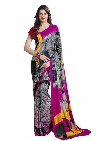 Add Some Casuals With This Pretty Saree Fabricated On Crepe. This?Saree And Blouse are Beautified With prints And It Is Light Weight And Easy To Carry All Day Lon