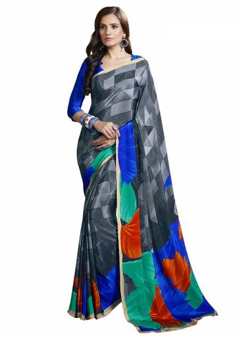 Add Some Casuals With This Pretty Saree Fabricated On Crepe. This?Saree And Blouse are Beautified With prints And It Is Light Weight And Easy To Carry All Day Lon