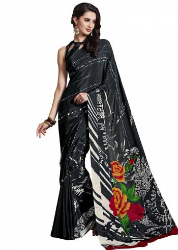 Add Some Casuals With This Pretty Saree Fabricated On Crepe. This?Saree And Blouse are Beautified With prints And It Is Light Weight And Easy To Carry All Day Lon