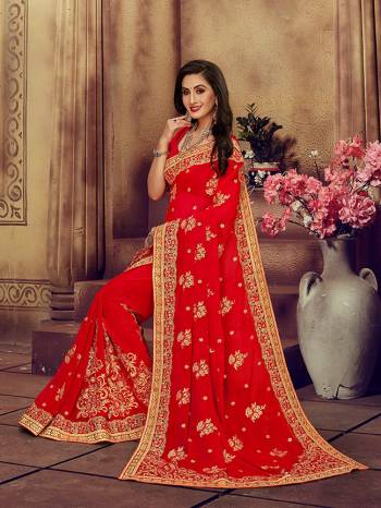 For The Upcoming Wedding Season, Here Is a Perfectly Suitable Saree In Red Color Paired With Red Colored Blouse. This Saree And Blouse Are fabricated On Georgette Beautified With Embroidery Highlighted With Stone Work. Buy This Beautiful Designer Saree Now.