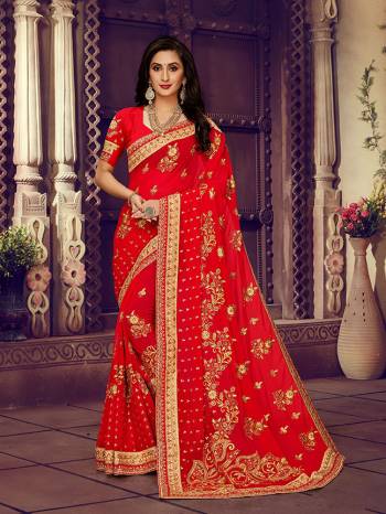 For The Upcoming Wedding Season, Here Is a Perfectly Suitable Saree In Red Color Paired With Red Colored Blouse. This Saree And Blouse Are fabricated On Georgette Beautified With Embroidery Highlighted With Stone Work. Buy This Beautiful Designer Saree Now.