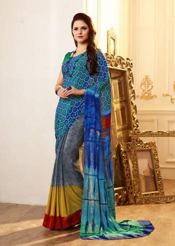 Add Some Casuals With This Pretty Saree Fabricated On Crepe. This Saree And Blouse are Beautified With prints And It Is Light Weight And Easy To Carry All Day Long